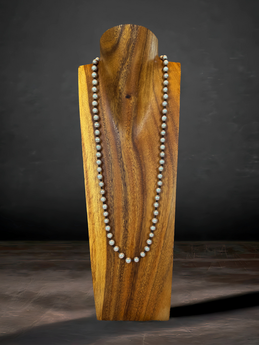 Beautifully crafted 36" gray freshwater pearls, double-knotted on Greek leather for a sophisticated, earthy aesthetic.